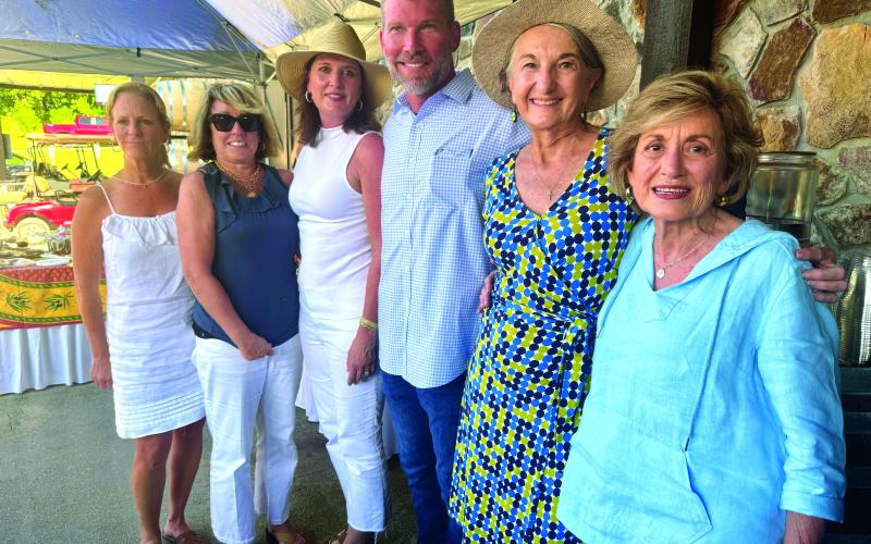 Submitted photo. Diane White (from left), Patricia Jones, Christy and Charles Martin, Lin Goen, and Elizabeth Darby are all smiles after an afternoon spent with award-winning New York Times bestselling author Charles Martin.
